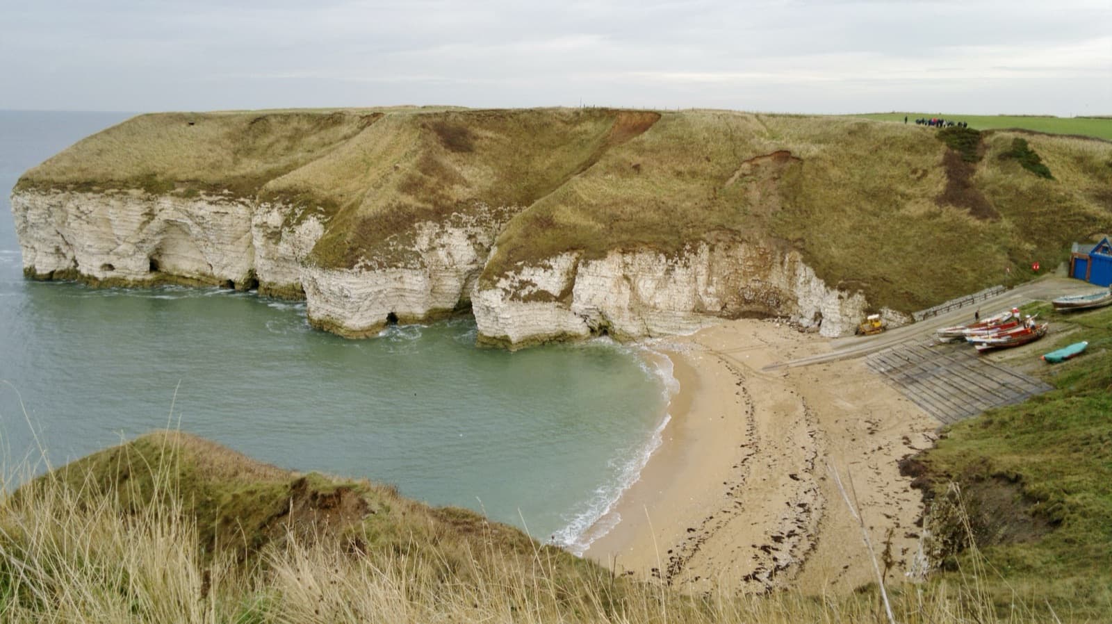 North Landing cove at Flamborough: chalk cliffs, sand and the old lifeboat slipway